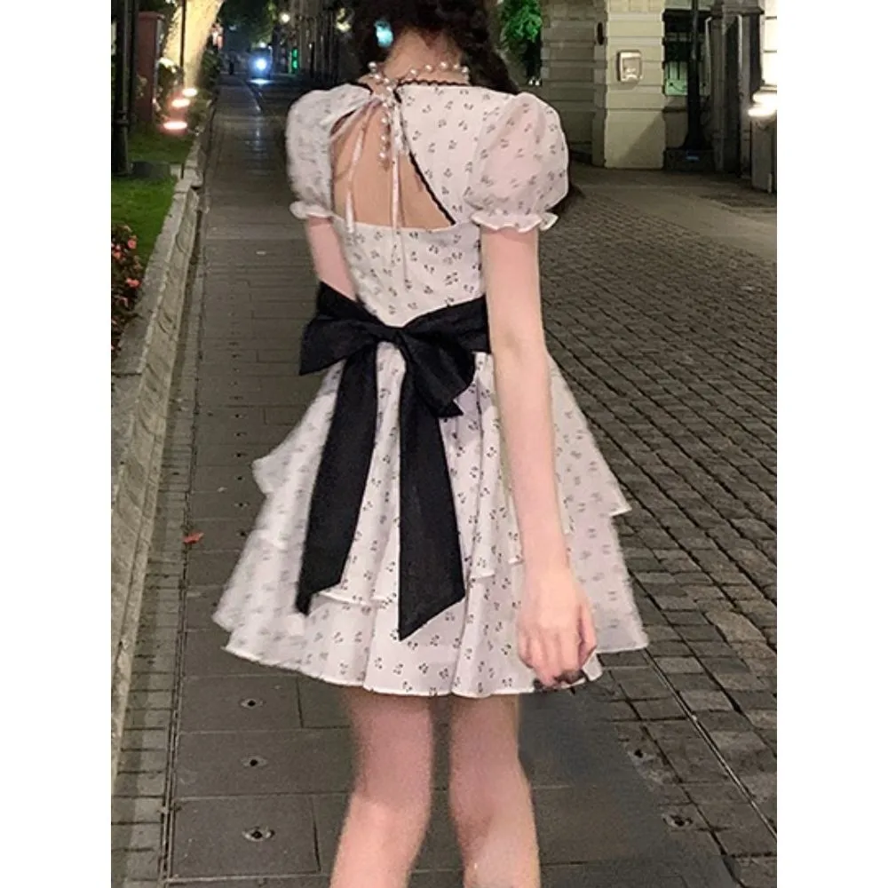 French Chic Meets Floral Grace in White Dress