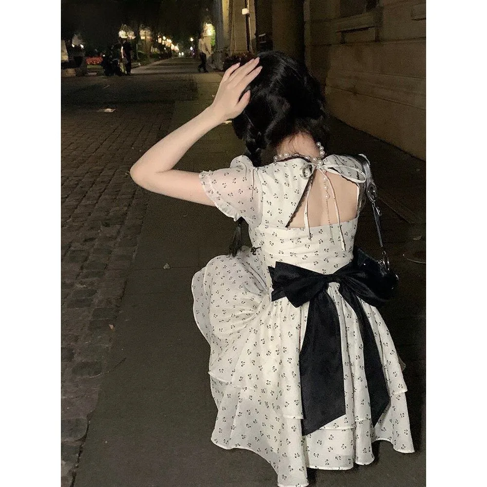 French Chic Meets Floral Grace in White Dress
